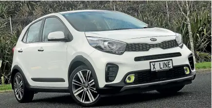  ?? DAMIEN O’CARROLL ?? The Kia Picanto X Line does use a lot of SUV styling cues. But what is an SUV these days anyway?