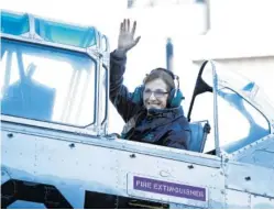  ?? THE ASSOCIATED PRESS ?? U.S. Rep. Martha McSally, R-Ariz., waves from a T-6 WW2 airplane as she leaves from Tucson, Ariz., for Phoenix on Friday. McSally announced she is running for the senate seat being vacated by fellow Republican Jeff Flake.