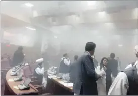  ?? Picture: EPA ?? BRAZEN: A picture made available by a member of the Afghan parliament, Dr Najibullah Faiq, captures the scene inside the building following the attack.