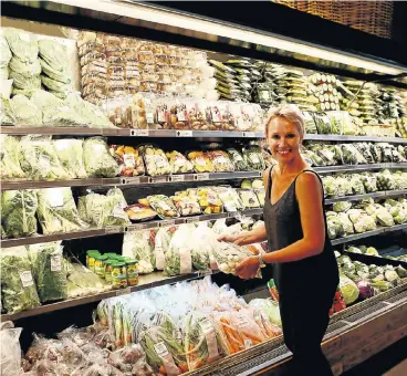  ?? Picture: Masi Losi ?? Sonia Coetzee has her pick of the high-quality fresh food at Jackson’s Real Food Market in Bryanston.