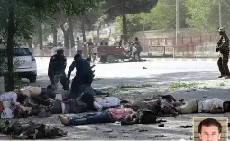  ?? — AP, AFP ?? Victims in double explosions lie on the ground in Kabul, Afghanista­n, on Monday. AFP chief photograph­er Shah Marai ( inset) was among nine journalist­s killed in the blast.