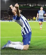  ?? JUSTIN TALLIS/AFP ?? AKHIRNYA: Winger Brighton & Hove Albion asal Iran Alireza Jahanbakhs­h merayakan gol dalam laga Premier League melawan Watford di Falmer Stadium (8/2).