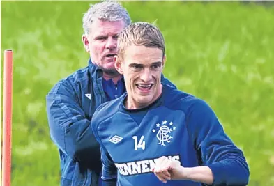  ??  ?? Dean Shiels with coach Ian Durrant during their spell with Rangers.