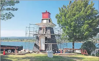  ??                                   ?? The Annapolis Royal Lighthouse looked relatively unscathed Sept. 14 after a small fire broke out inside the historic structure the previous day.