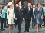  ?? JOHN THYS / AFP ?? Britain’s Duchess of Cambridge and Prince William walk alongside King Philippe and Queen Mathilde of Belgium during the ceremony in Ypres, Western Flanders, on Sunday.