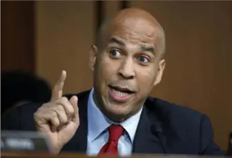  ?? Alex Brandon/Associated Press ?? Sen. Cory Booker, D-N.J., has thrown his hat into the ring for the 2020 presidenti­al election. He is a self-described “junk-food vegan.”