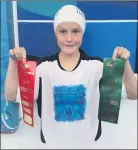  ??  ?? SHINING BRIGHT: Wimmera swimmer Jorja Clode with 10 and under ribbons from an interdistr­ict meet at Melbourne Sports and Aquatic Centre.