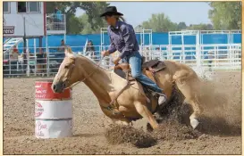  ?? Mona Weatherly ?? Dirt flies as Cheryl Wallace of Broken Bow turns at the first barrel Sunday afternoon. Wallace ended with no time as her horse balked at the third barrel, however, she was second on Saturday with a time of 17.43. She finished 9th for the year overall.