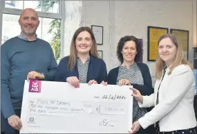  ?? (Photo: Katie Glavin) ?? Debbie Kelleher (right) of Field of Dreams - Down Syndrome Cork, accepting a cheque from Dr Ed Bates, Chloe O’Brien and Breeda McNamara, of Kilworth Chiropract­ic Clinic.