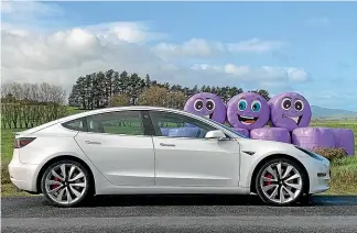  ?? PHOTOS: DAVID LINKLATER/STUFF ?? The Model 3 on Kiwi roads: are we happy? Yes.