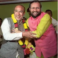  ?? ?? MANIPUR CHIEF MINISTER N. Biren Singh with BJP’S Manipur in-charge Prakash Javadekar in Imphal on March 13, 2017. The Congress was the largest party, but the BJP’S money and muscle power came ahead.