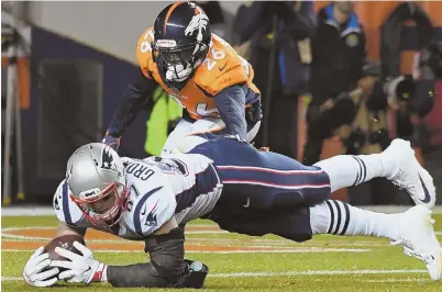  ?? GETTY IMAGES ?? SO CLOSE: Rob Gronkowski appears to make a catch in the second quarter of the Pats’ win Sunday night. But the ruling on the field was incomplete, and the call stood after a replay challenge.