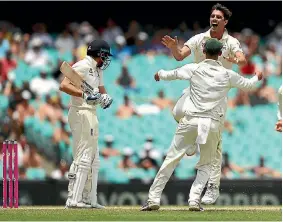  ?? RYAN PIERSE/ GETTY IMAGES ?? Australia’s Pat Cummins celebrates after taking the wicket of Jonny Bairstow, of England, during day five of the fifth test at the Sydney Cricket Ground.