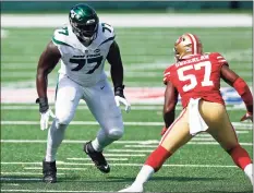  ?? Adam Hunger / Associated Press ?? Jets tackle Mekhi Becton (77) in action during Sunday’s loss to the 49ers.