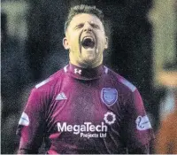  ??  ?? GET BIN THERE Linn celebrates after putting Arbroath ahead