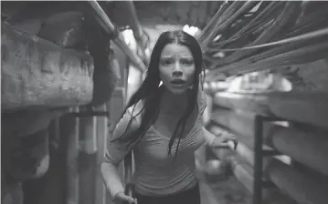  ?? UNIVERSAL PICTURES ?? Casey ( Anya Taylor- Joy) tries to escape captivity in Split.