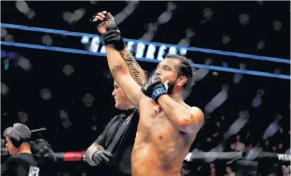  ?? REUTERS ?? Jorge Masvidal of the Ultimate Fighting Championsh­ip celebrates his win against Darren Till in March 2019.