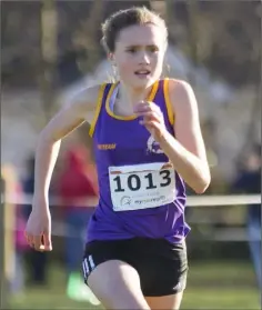  ??  ?? Clara Keane of D.M.P. on her way to finishing fifth in the Under-15 race.