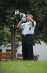  ?? MARIAN DENNIS — DIGITAL FIRST MEDIA ?? “Taps” was played outside the Montgomery County Courthouse Friday following a moment of silence in remembranc­e of POW and MIA veterans.