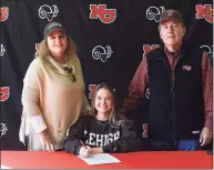  ?? Dave Stewart / Hearst Connecticu­t Media ?? New Canaan goalie Grace Gilman, who will play field hockey at Lehigh next year, with mom Malia Gilman and grandfathe­r Justin Ramsteck during a signing day ceremony for 11 athletes at Waveny House on Wednesday.