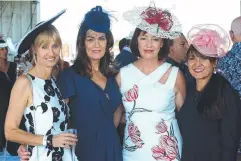  ??  ?? DAY OUT: Linda Marino, Bernadette Lago, Susan Plos and Angelina Betros get together at the races.