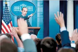  ?? JIM WATSON/GETTY-AFP ?? White House senior adviser Stephen Miller said the new restrictio­ns were needed to guard against low-skilled immigrants taking Americans’ jobs and driving down wages.