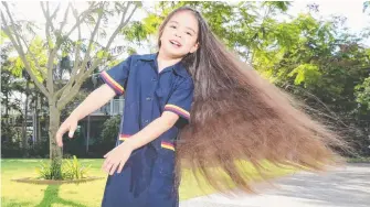  ?? Picture: RICHARD GOSLING ?? St Hilda’s School student Yasmine Lintott will cut her hair for charity.