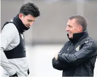  ??  ?? NEW POST Rodgers and Maguire at Leicester yesterday