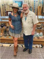  ?? ?? Joe E. Tanner Sr. and daughter Emerald Tanner pose in front of a gallery showcase. Photo by Emerald Tanner.