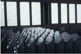  ??  ?? BELOW
Memorial tablets are seen inside a hall at Jiuyang Palace. A total of 558 tablets are inscribed with the names and hometowns of people who died after contractin­g the coronaviru­s or while battling the pandemic in China.