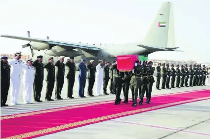  ?? Wam ?? The body of Saif Youssef Ahmed Al Falasi, who was killed on duty in Yemen, is received at Al Bateen Airport in Abu Dhabi.