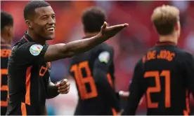  ?? Kenzo Tribouilla­rd/AFP/Getty Images ?? Georginio Wijnaldum shows his delight after scoring the Netherland­s’ third goal. Photograph: