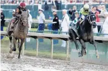  ?? GARRY JONES/AP ?? John Velazquez rides Always Dreaming to victory in the 143rd running of the Kentucky Derby at Churchill Downs on Saturday.