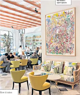  ??  ?? CAFE CULTURE
Colourful artworks adorn the hotel’s open spaces