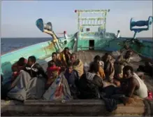  ?? TYLER HICKS, NEW YORK TIMES ?? Captured Somali pirates in the Gulf of Oman, in 2012. After years of quiet seas, Somali pirates have waylaid four ships in early 2017.