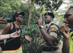  ?? Photo: James Akena/Reuters ?? Hopes dashed: Police question a member of Uganda’s LGBTI community, which had gathered for Saturday’s Pride parade in Entebbe, before asking participan­ts to disperse.