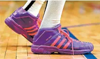  ?? ICON SPORTSWIRE ?? Denver Nuggets guard Nick Young’s day-glo Adidas sneakers.