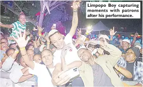  ?? ?? Limpopo Boy capturing moments with patrons after his performanc­e.