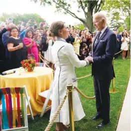  ?? AP PHOTO/EVAN VUCCI ?? President Joe Biden greets Mexico’s first lady Beatriz Gutierrez Muller during a Cinco de Mayo event in the Rose Garden of the White House on Thursday in Washington.