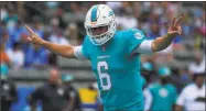  ?? Mark J. Terrill / Associated Press ?? Miami Dolphins quarterbac­k Jay Cutler could have been in the other huddle with the Jets on Sunday.