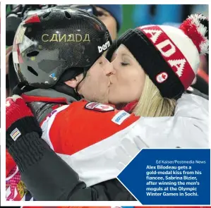  ?? Ed Kaiser/Postmedia News ?? Alex Bilodeau gets a gold-medal kiss from his fiancee, Sabrina Bizier, after winning the men’s moguls at the Olympic Winter Games in Sochi.