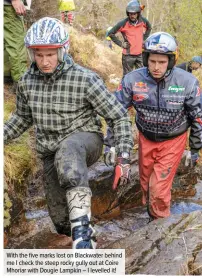  ??  ?? With the five marks lost on Blackwater behind me I check the steep rocky gully out at Coire Mhoriar with Dougie Lampkin – I levelled it!