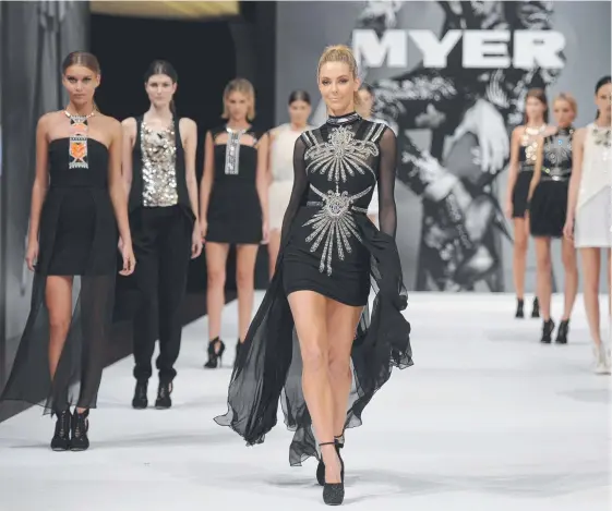  ??  ?? Jennifer Hawkins wearing Sass & Bide for Myer – the luxury label played a big role in the company’s third-quarter sales drop.