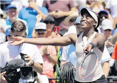  ?? LYNNE SLADKY/AP ?? Sloane Stephens celebrated on the court with friends and family after winning the singles title at the Miami Open on Saturday.