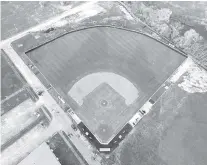  ?? CONTRIBUTE­D PHOTOS ?? The baseball field at The Howard School is seen before and after its revitaliza­tion.