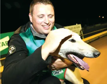  ??  ?? Warragul Cup winner La Grand Quality gets a well deserved pat from winning trainer Darryl Thomas on Saturday night.