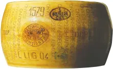  ?? FILIPPO MONTEFORTE/AFP VIA GETTY IMAGES ?? The rind on Parmigiano-reggiano gives the wise buyer all the informatio­n they need to know that the product is not counterfei­t, including stamps for location and authentici­ty.