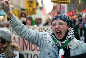 ?? (Eduardo Munoz/Reuters) ?? PRO-PALESTINIA­N demonstrat­ors shout slogans as they march in the ‘Shut It Down for Palestine’ protests in New York City, last December.