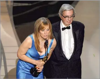  ?? Michael Caulfield WireImage ?? HIGH HONORS Larry McMurtry and Diana Ossana won the 2006 Oscar for adapted screenplay for “Brokeback Mountain,” one of more than 40 screenplay­s he wrote. “Lonesome Dove” garnered him the 1986 Pulitzer Prize in fiction.