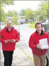  ?? DAVID MAHER/THE TELEGRAM ?? Liberal candidate Paul Antle and campaign assistant Len White head to the next door Wednesday to count their last votes ahead of Thursday’s election.